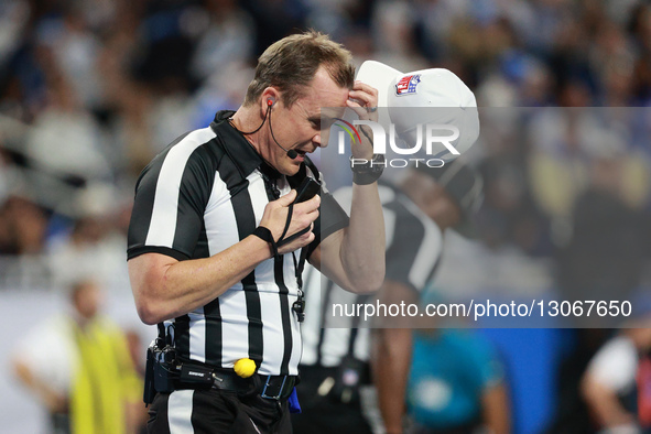 DETROIT,MICHIGAN-DECEMBER 4: Referee Shawn Hochuli #83 is seen during the first half of an NFL football game between the Dallas Cowboys and... by Jorge Lemus/NurPhoto