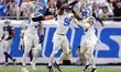 DETROIT,MICHIGAN-December4: Linebacker Al-Quadin Muhammad (96) of the Detroit Lions is con...