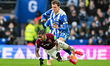 Crysencio Summerville of West Ham and Mats Wieffer of Brighton & Hove Albion clash during...