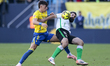 Iker Recio of Cadiz CF competes for the ball with Asier Villalibre of Real Racing Club dur...