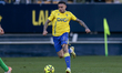 Roger Marti of Cadiz CF runs with the ball during the La Liga Hypermotion match between Ca...