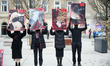 Members of the "Loud Vegans" activist group are seen during a rally in Warsaw, Poland on &...