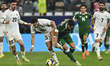 Omar Khrbin of Syria and Michael Termini of Palestine are in action during the Group A FIF...