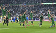 Players of Syria celebrate after qualifying for the knockout stage after the Group A FIFA...