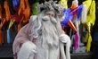 Jose Miguel Moctezuma, a street artist, human statue, and makeup artist, dresses as Santa...