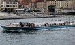 People are on board a canal tour boat in Copenhagen, Denmark, on June 8, 2025. 