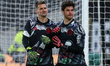 Tom Heaton and Senne Lammens of Manchester United warm up for the Premier League match bet...