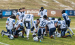 The Villanova Wildcats huddle before an NCAA Football Championship Series football game at...