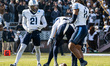 The Villanova Wildcats watch the punt roll during an NCAA Football Championship Series foo...