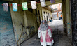The artist Jose Miguel Moctezuma, known as Santa Iluminado, makes a tour in the Tepito nei...