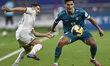 Youcef Atal of Algeria and Ahmed Yahya of Iraq are in action during the Group D FIFA Arab...