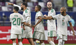 Youcef Atal of Algeria celebrates with teammates after scoring during the Group D FIFA Ara...