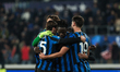 Atalanta BC players celebrate at the end of the UEFA Champions League football match betwe...
