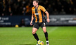 Ben Purrington of Cambridge United controls the ball during the Sky Bet League 2 match bet...