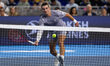 Joao Fonseca of Brazil returns a shot during the Miami Invitational at loanDepot Park in M...