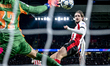 PSV Eindhoven defender Yarek Gasiorowski and PSV Eindhoven goalkeeper Matej Kovar cannot p...