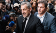 France's former President Nicolas Sarkozy arrives for an autograph session of his book ''D...