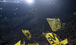 Supporters of Borussia Dortmund attend the match between Borussia Dortmund and FK Bodo/Gli...