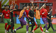 Players of Morocco celebrate after winning the FIFA Arab Cup 2025 Quarter-final match betw...