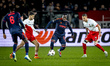 Nottingham Forest FC forward Arnaud Kalimuendo and FC Utrecht defender Mike Eerdhuijzen pa...