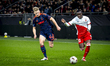 Nottingham Forest FC defender Zach Abbott and FC Utrecht forward Yoann Cathline play durin...