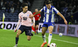 Adrian Skogmar of Malmo and Francisco Moura of FC Porto are seen in action during the UEFA...