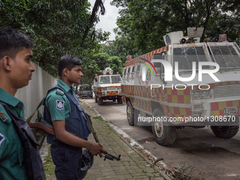 Police force is on duty at the Gulshan area on the next road of the crime scene. July 2nd, 2016. Dhaka, Bangladesh. (