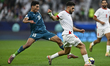 Amer Jamous of Jordan and Ahmed Yahya of Iraq are in action during the FIFA Arab Cup 2025...
