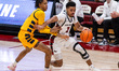 KHAAFIQ MYERS (3) of the St. Joseph's Hawks drives the ball during an NCAA men's basketbal...