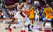 Jaiden Glover-Toscano (11) of the St. Joseph's Hawks drives the ball during an NCAA men's...
