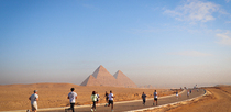 Editorial photo: Runners participate in the Pyramids Half Marathon in Giza, Egypt, on December 13, 2025.  by Ahmed Mosaad/NurPhoto