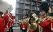People gather to watch a Christmas parade in Sao Paulo, Brazil, on December 13, 2025. 
