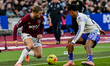 Jarrod Bowen of West Ham is challenged by Ian Maatsen of Aston Villa during the Premier Le...