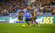 Matt Clarke takes on Harry Amass during the Sky Bet Championship match between Sheffield W...