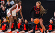 Zachara Perkins (22) of the Rutgers Scarlet Knights possesses the ball during an NCAA wome...