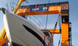 The Princess F65 yacht is loaded by ''Big Willi,'' the giant crane, along the Rhine River...