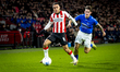 PSV Eindhoven defender Sergino Dest and GVVV forward Arwin van Soest play during the match...
