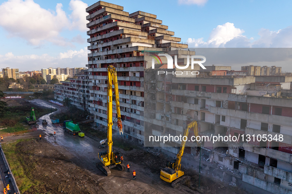 The demolition machines strike the first blows to Scampia's Vela Rossa in Naples, Italy, on Wednesday morning. This marks the beginning of t... by Paolo Manzo/NurPhoto