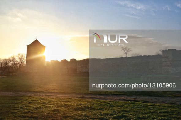 The sun sets behind the Bilhorod-Dnistrovskyi Fortress, also known as the Akkerman Fortress, in Bilhorod-Dnistrovskyi, Odesa region, Ukraine... by Nina Liashonok/Ukrinform/NurPhoto