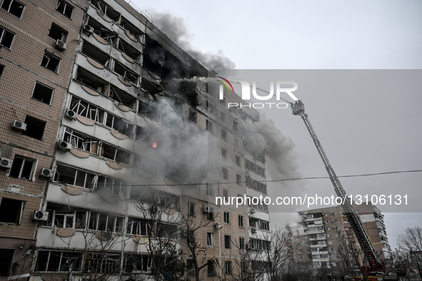 A firefighter uses an aerial ladder to suppress a fire in an apartment block hit by a Russian guided aerial bomb in Zaporizhzhia, Ukraine, o... by Dmytro Smolienko/Ukrinform/NurPhoto