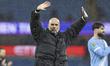 Manchester City F.C. manager Pep Guardiola applauds at full time during the Carabao Cup Qu...