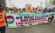 Members of civil society groups and the Nigeria Labour Congress hold a peaceful protest in...