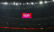 The LED screen shows the match attendance as 84,517 during the FIFA Arab Cup 2025 final ma...