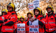 Dozens of firefighters protest at the Catalan Interior Ministry on the day they file joint...