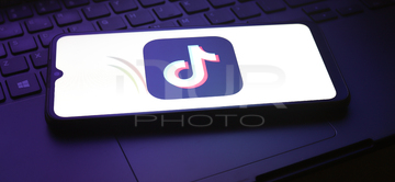 Gallery cover photo: TikTok Signs Agreement For Sale In The United States