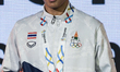 Thitiwat Phlongaurai of Thailand poses on a podium during the medal ceremony for the Men's...