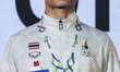 Sarawut Sukthet of Thailand poses on a podium during the medal ceremony of the Men's feath...
