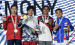 Thipsatcha Yodwaree of Thailand, the gold medalist, celebrates on the podium with Ngoc Lin...