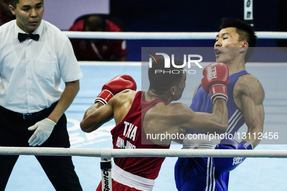 Bunjong Sinsiri of Thailand competes against Tan Jun Jie Velvan of Singapore during the Men's welterweight 69kg finals - Gold medal boxing m... by Anusak Laowilas/NurPhoto