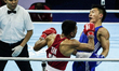 Bunjong Sinsiri of Thailand competes against Tan Jun Jie Velvan of Singapore during the Me...